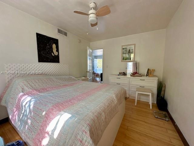 bedroom featuring ceiling fan and light wood-type flooring