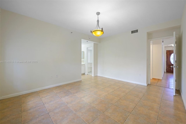 view of tiled spare room