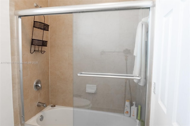 bathroom with enclosed tub / shower combo