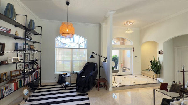 entryway featuring crown molding