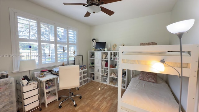 bedroom with wood-type flooring