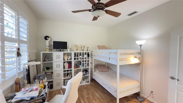 bedroom featuring wood-type flooring