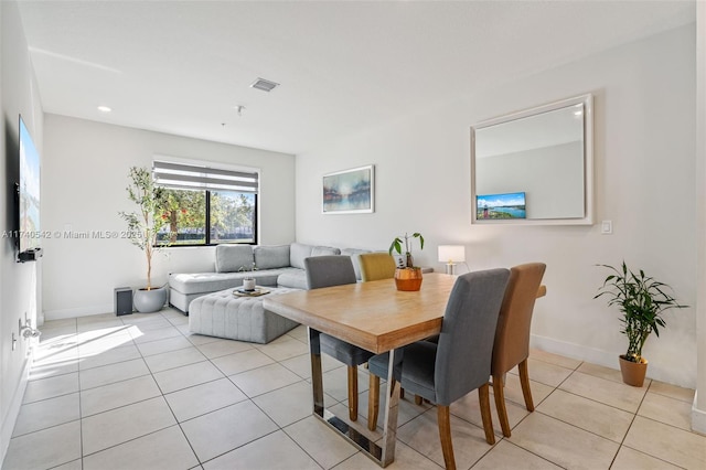 dining room featuring light tile patterned floors