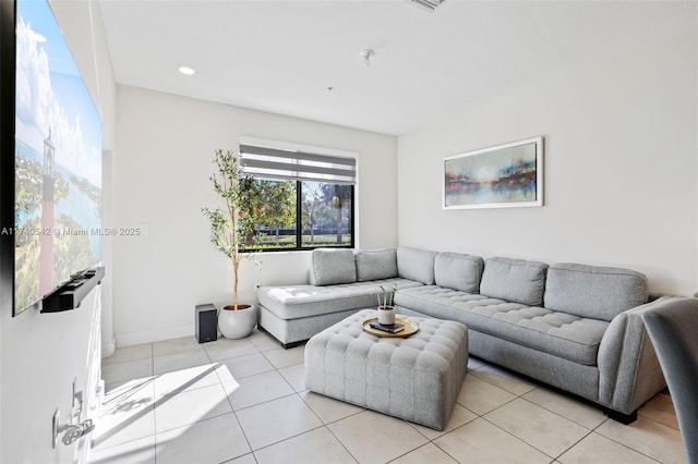 living room featuring light tile patterned flooring