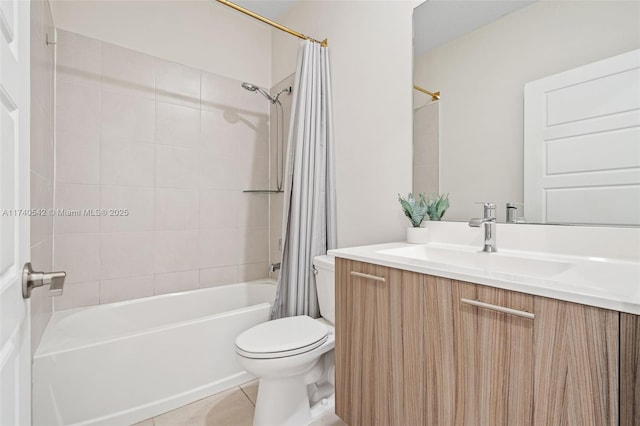 full bathroom with shower / tub combo with curtain, tile patterned floors, toilet, and vanity