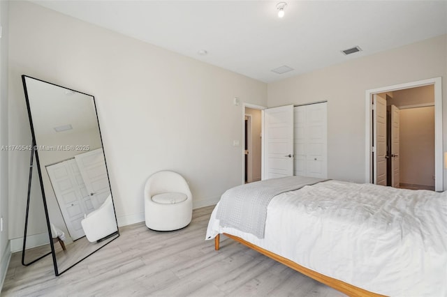 bedroom featuring light hardwood / wood-style flooring