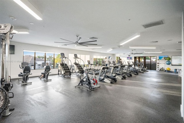 exercise room featuring ceiling fan