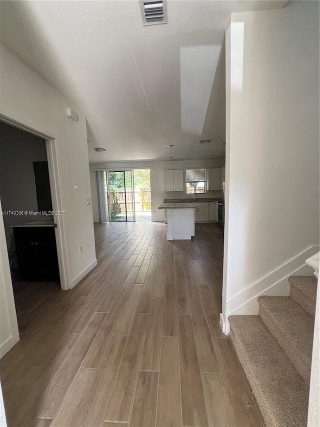 hallway featuring light hardwood / wood-style flooring