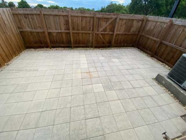 view of patio with central AC unit