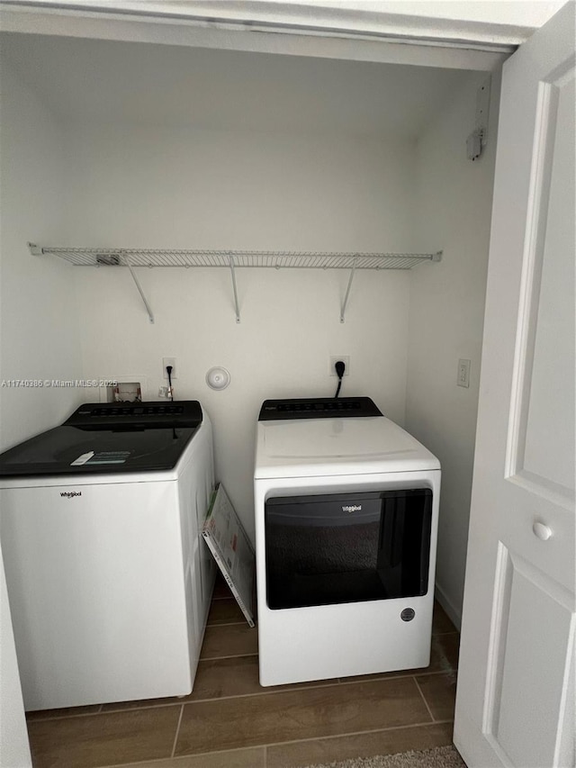 clothes washing area featuring washing machine and dryer