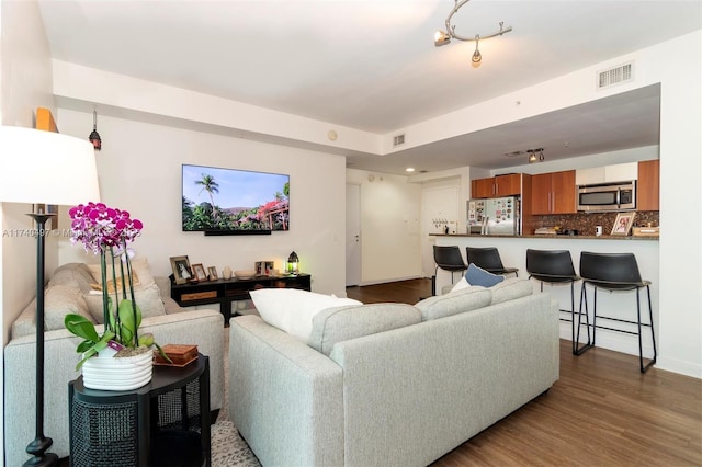 living room with hardwood / wood-style flooring