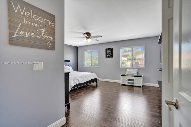 bedroom featuring dark wood-type flooring and ceiling fan