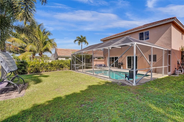 exterior space featuring a yard, a lanai, and a patio area