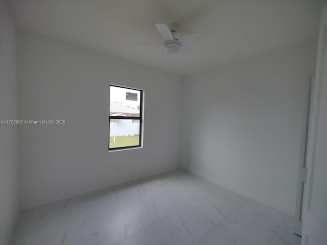 unfurnished room featuring ceiling fan