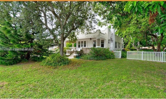 view of yard with fence