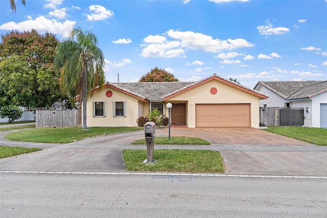 view of front facade featuring a garage and a front lawn