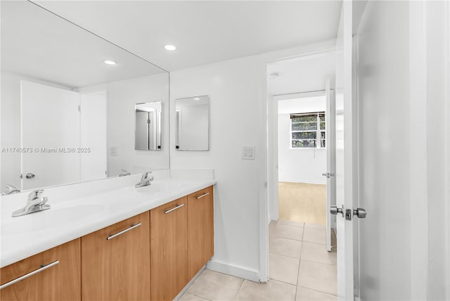 bathroom with vanity and tile patterned floors