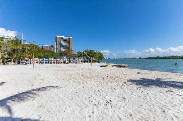 property view of water featuring a beach view