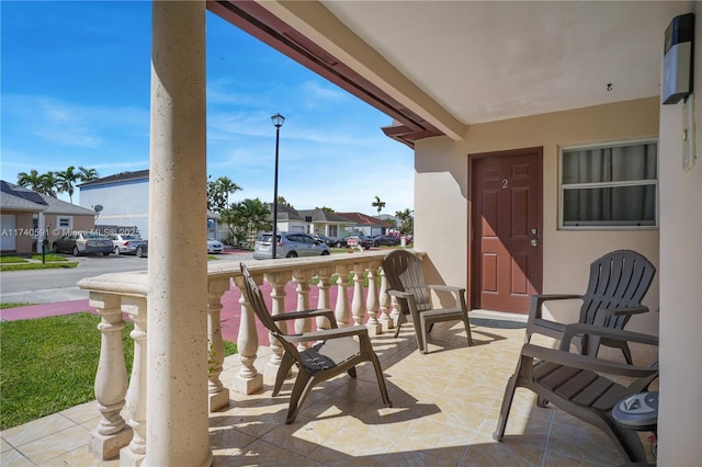 view of patio featuring a porch