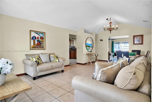 tiled living room featuring vaulted ceiling, a textured ceiling, and an inviting chandelier