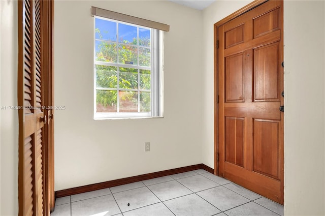 unfurnished bedroom with light tile patterned floors