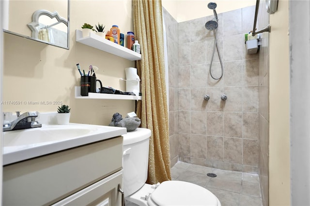 bathroom with vanity, toilet, and a shower with shower curtain