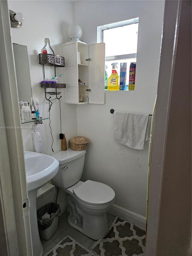 1260 NW 4th St, Miami, FL 33125 - bathroom with toilet and baseboards