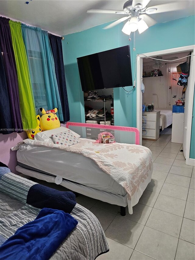 1260 NW 4th St, Miami, FL 33125 - tiled bedroom featuring ceiling fan