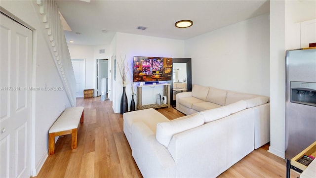 living room with light wood-type flooring