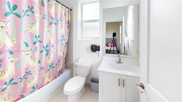 full bathroom with vanity, shower / bath combination with curtain, tile patterned floors, and toilet