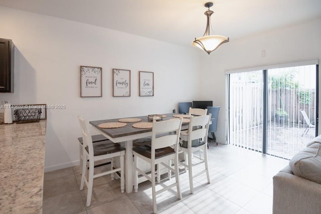 dining room with light tile patterned floors