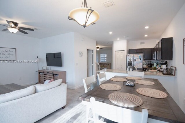 dining area featuring ceiling fan