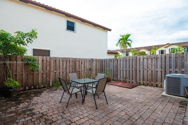 view of patio with central AC unit