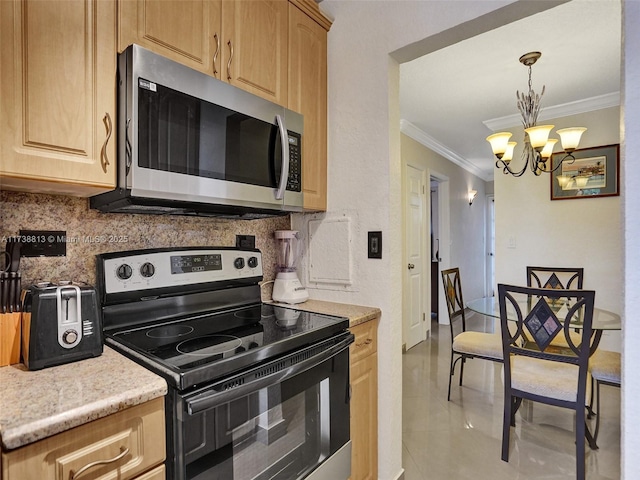 kitchen featuring stainless steel appliances, tasteful backsplash, a notable chandelier, light stone counters, and ornamental molding