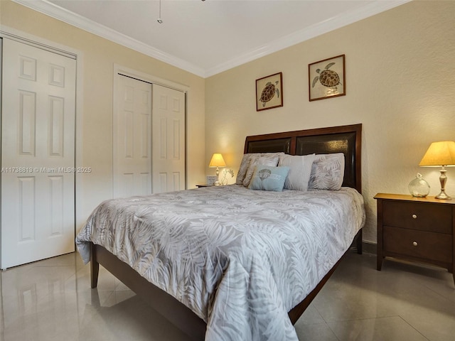 bedroom featuring light tile patterned floors, crown molding, and a closet