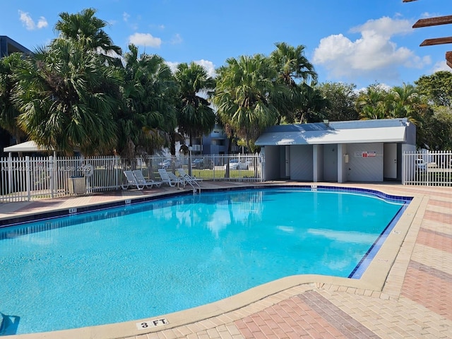 view of swimming pool featuring a patio area