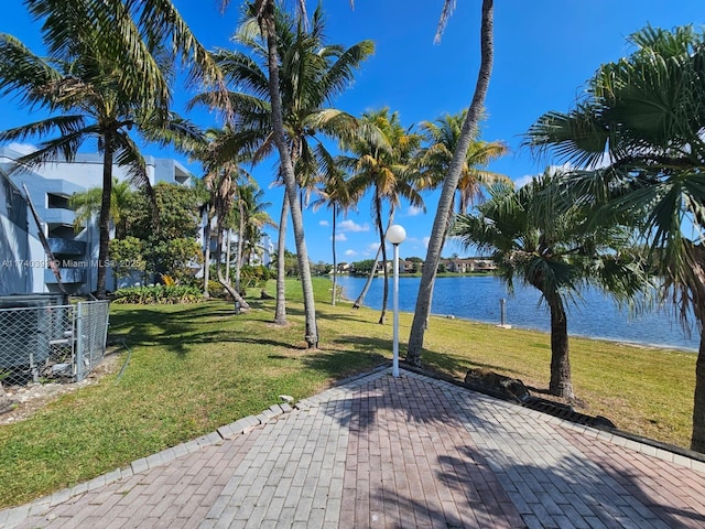 view of patio / terrace with a water view