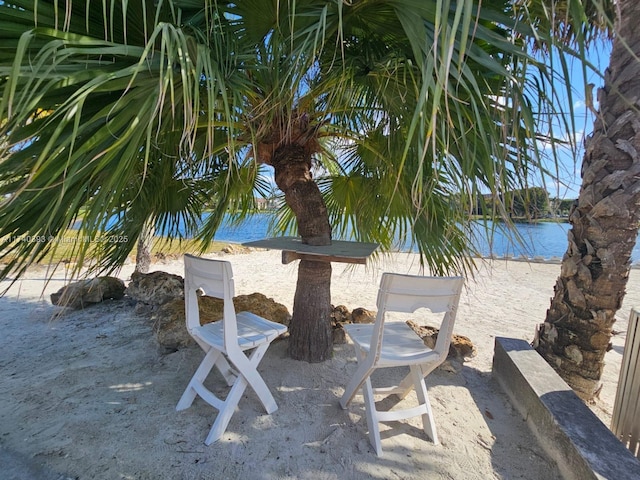 view of patio / terrace featuring a water view