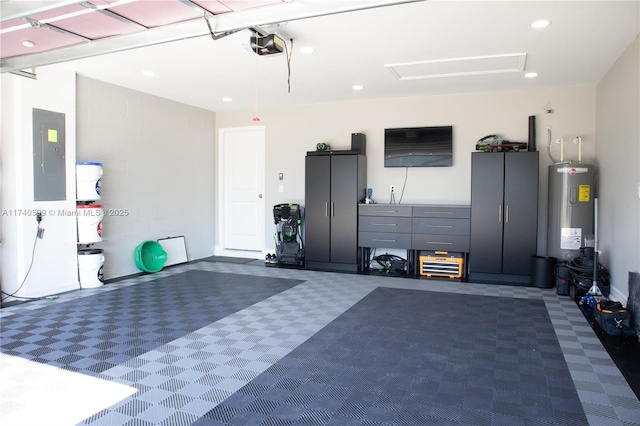 garage with a garage door opener, electric panel, and water heater