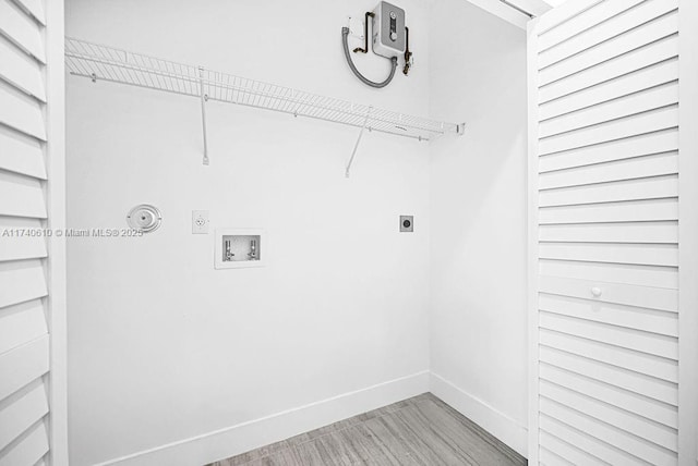 laundry room featuring gas dryer hookup, hookup for an electric dryer, and hookup for a washing machine