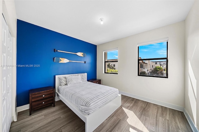 bedroom featuring hardwood / wood-style flooring