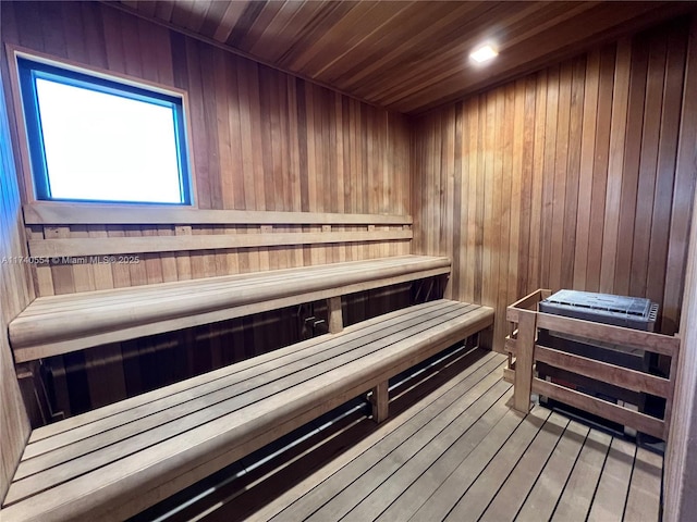 view of sauna featuring hardwood / wood-style flooring