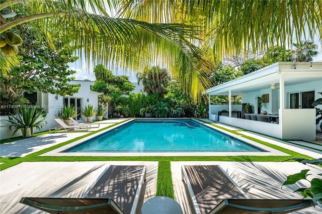 outdoor pool with a patio