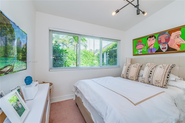 carpeted bedroom with baseboards