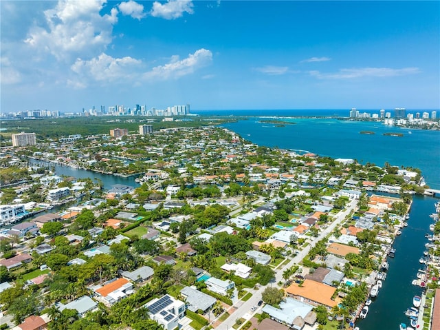 drone / aerial view with a water view and a view of city