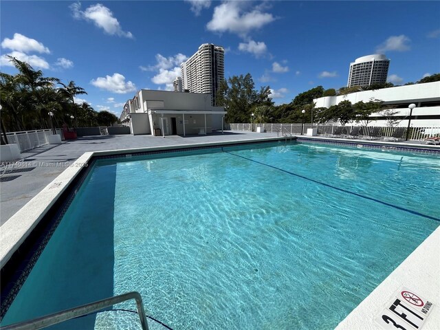 view of swimming pool featuring a patio