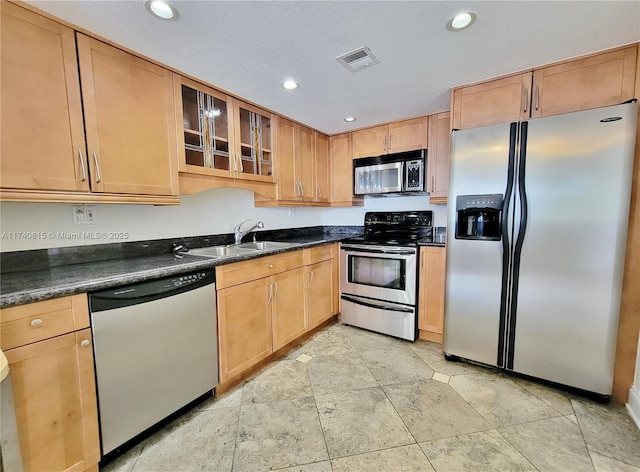 kitchen featuring appliances with stainless steel finishes and sink