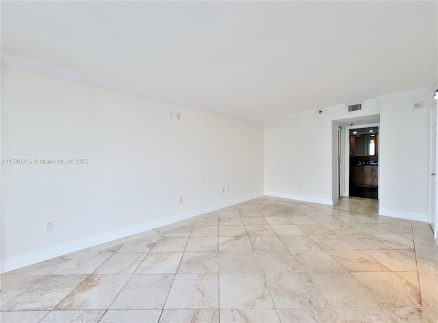 unfurnished room featuring ornamental molding