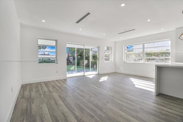 empty room featuring hardwood / wood-style flooring