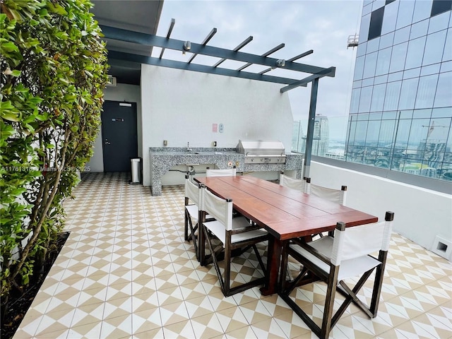 view of patio / terrace featuring an outdoor kitchen and grilling area